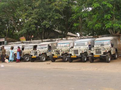 A taxi stand in south India with jeeps as taxis