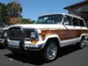 This is not mine, though it looks just like my old white 1984 Grand Wagoneer... except this restored model is worth $24,000 and mine, after being wrecked and sitting for 10 years, was sold for $1. 