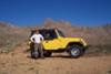  Here's a picture of my boyfriend next to the Jeep. 