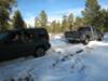 Chevy Truck Pulling Out A Jeep That Got Stuck In Snow