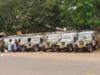 A taxi stand in south India with jeeps as taxis